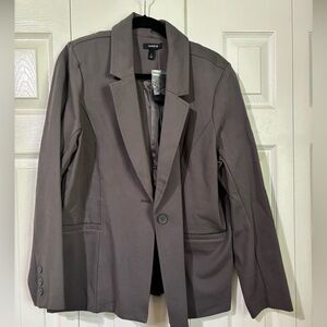 Grey blazer never been worn.